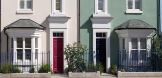 a row of pastel coloured houses