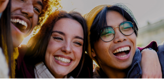 Young people who are friends embracing each other