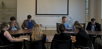 Picture from the debate competition with students and our members of staffs