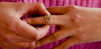Woman taking ring off