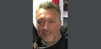 picture of David Molloy on grey background