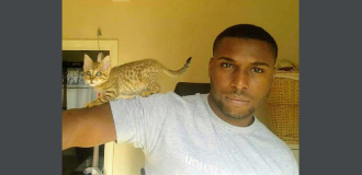 Image of victim Gavin Brown with his cat 
