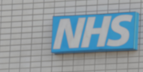 NHS Logo on the side of a hospital