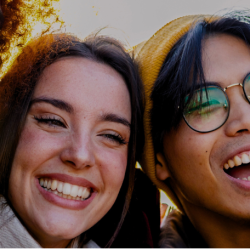 Young people who are friends embracing each other