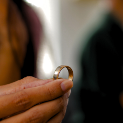 Woman taking her wedding ring off