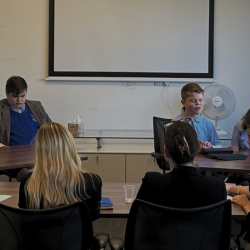 Picture from the debate competition with students and our members of staffs
